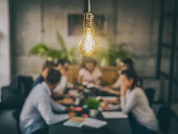 Group of researchers, light bulb center